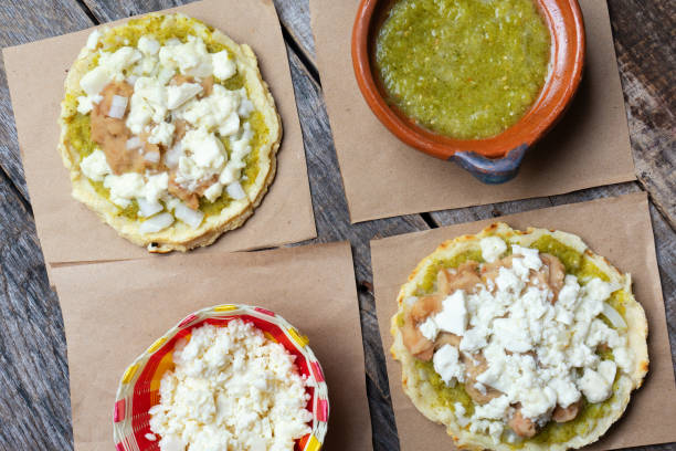 istock Mexican food: sopes with green sauce and beans 1152089240