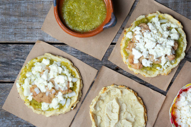 istock Mexican food: sopes with green sauce and beans 1152091712
