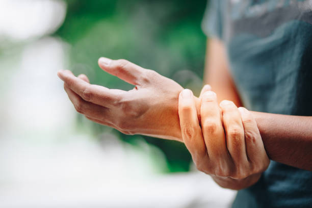 close up young women wrist pain , office syndrome , health care concept - rheumatism imagens e fotografias de stock