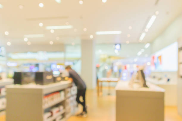 istock mobile phone in electronic store interior with customer abstract blurred background 1152101241