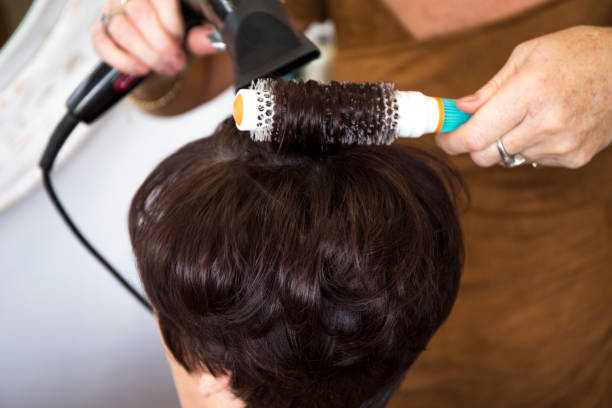 istock hairstyling in beaty salon 1152105613