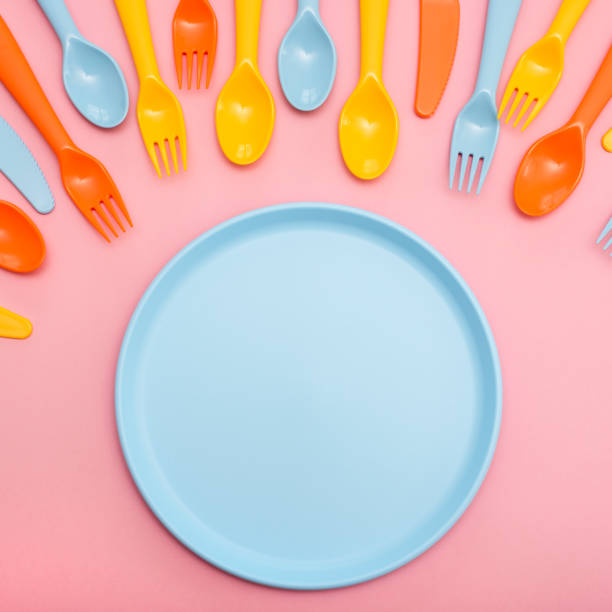 istock Colorful dining set on pink background 1152109176