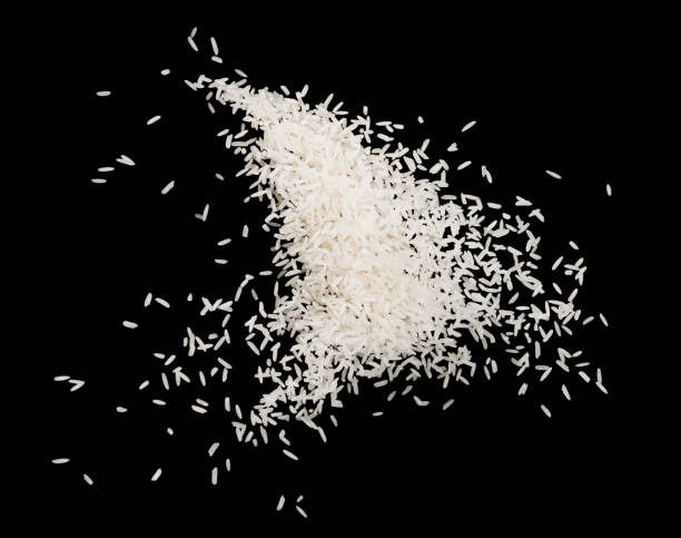 istock Stop motion white rice splash explosion isolated on black background food object design 1152110898