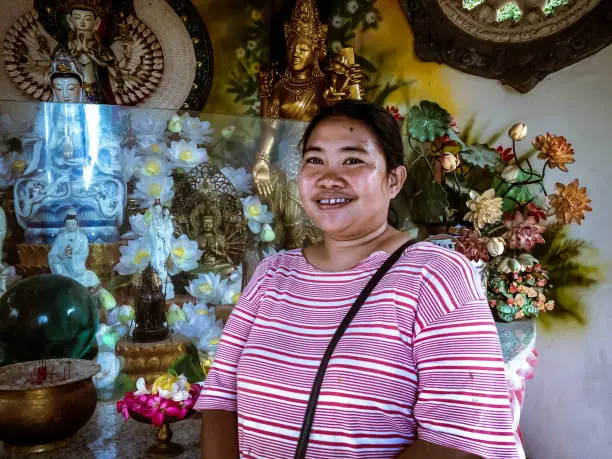 Woman Traveler Enjoy A Holiday In The Shrine Buddhist Room At Buddhist Temple, North Bali, Indonesia