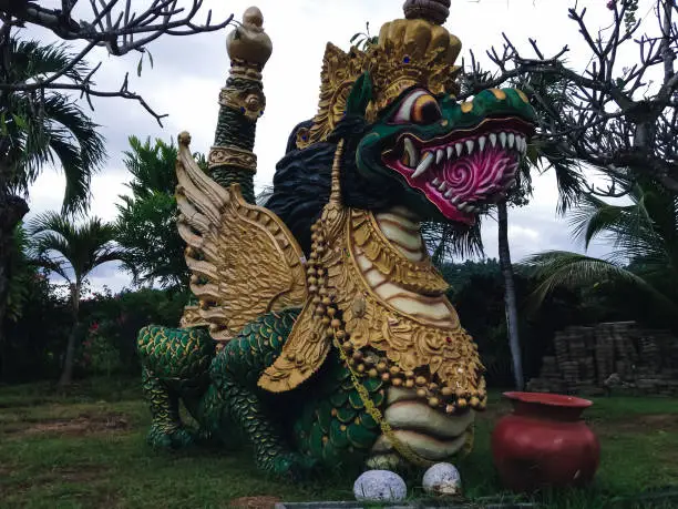 Big Green Dragon Statue In The Garden Yard At Buddhist Monastery At Banjar Tegeha Village, North Bali, Indonesia