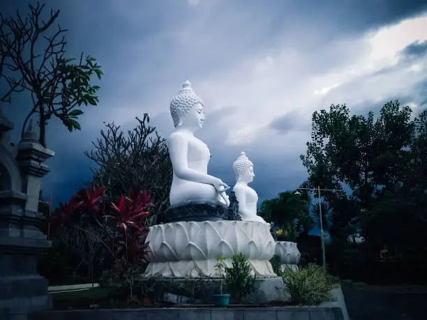 Religious Atmosphere Of Big White Buddha Statues In The Garden At Buddhist Monastery, Banjar Tegeha Village, North Bali, Indonesia