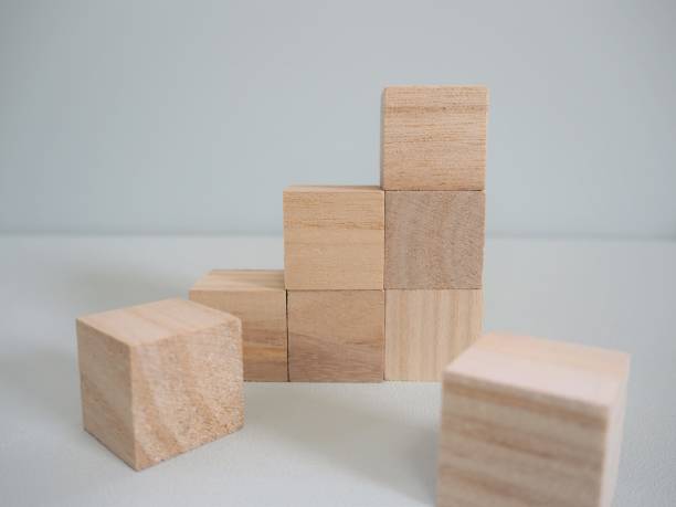 istock Small staircase of stacked wooden blocks 1152124911