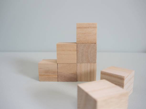 istock Small staircase of stacked wooden blocks 1152124912