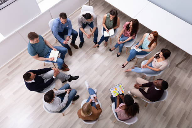 istock Overhead View Of Friend Sitting In Circle 1152125080