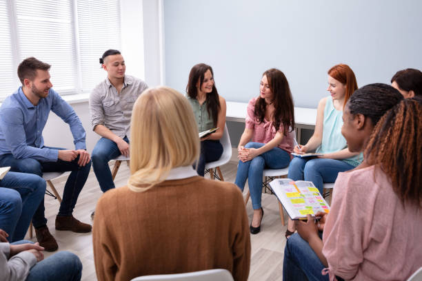 istock Smiling Group Of Young Friends Counseling 1152125085