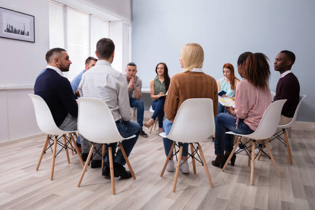 istock Multi-ethnic People Sitting In Circle Counseling 1152125143