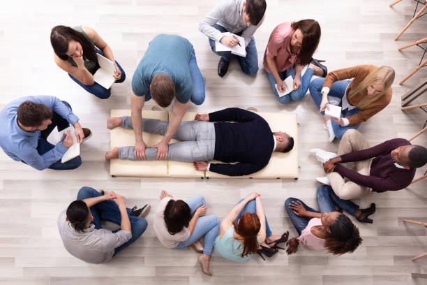 istock Elevated View Of Specialist Showing Massage Technique 1152125156