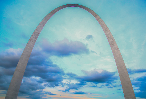 The St. Louis Arch during a cloudy summer day.