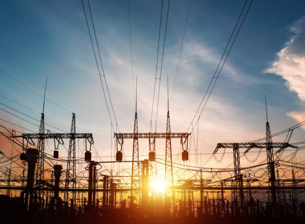 istock High-voltage power lines. Electricity distribution station. high voltage electric transmission tower. Distribution electric substation with power lines and transformers. 1152129499
