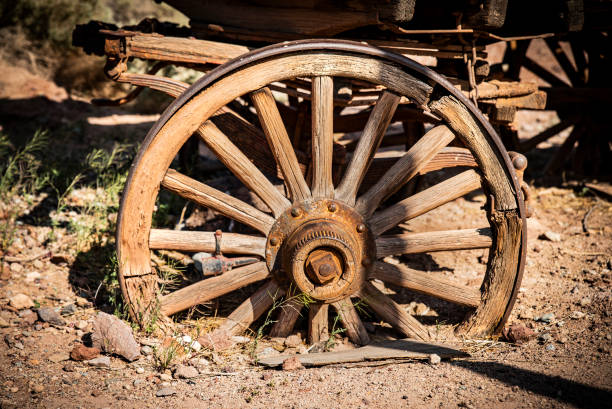 istock Old West wooden wagon wheel 1152131270