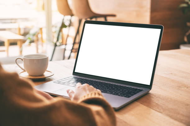 istock a woman's hand using and touching on laptop touchpad with blank white desktop screen 1152131369