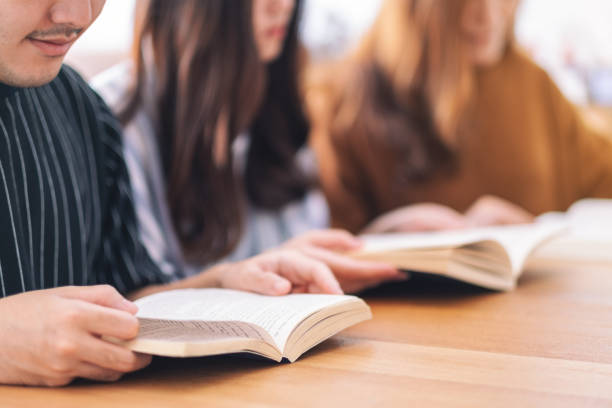 istock young people sitting and enjoyed reading books together 1152131385