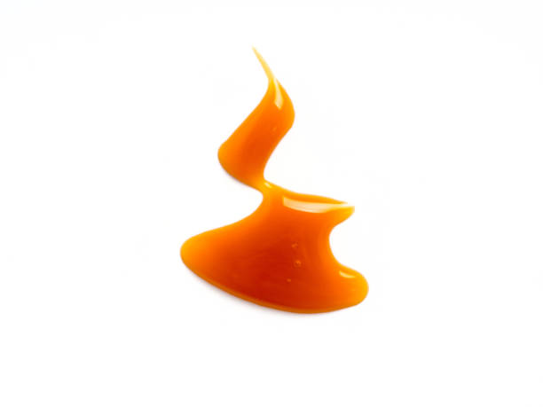 istock sweet caramel sauce isolated on white 1152132727