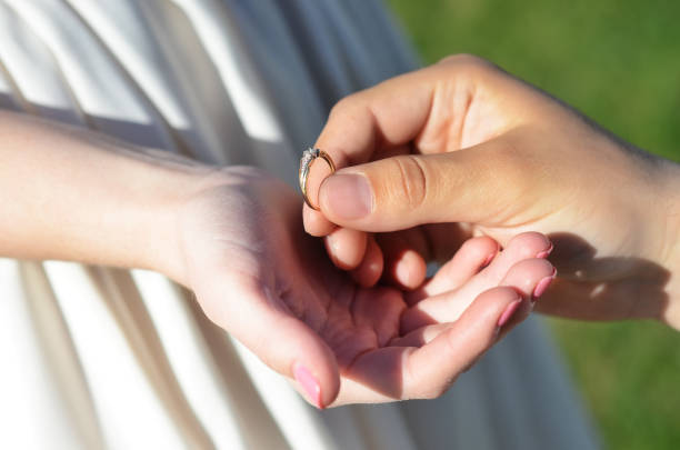 istock Wedding ring in the palm of your hand 1152132773