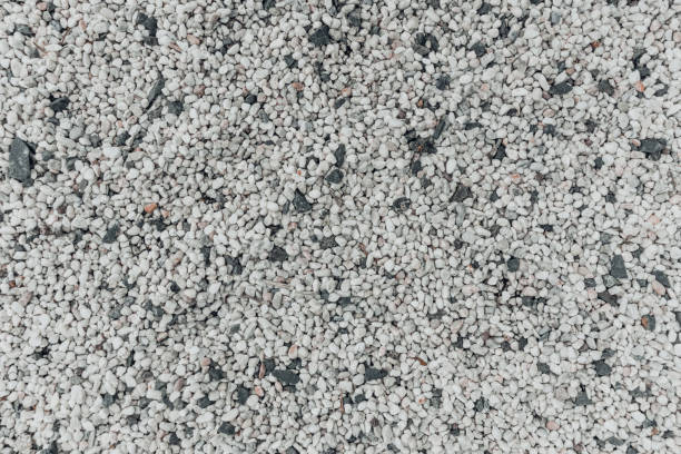 istock Natural white and black small stones background. 1152137150