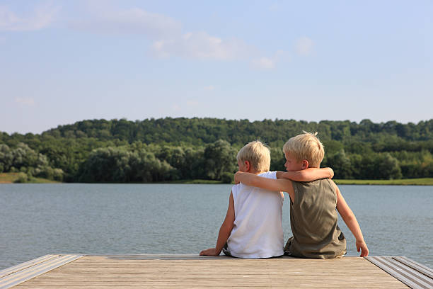 Boys sitting on stairs