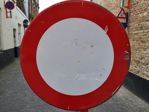 Zoom on a prohibiting passage sign, Ghent, Belgium