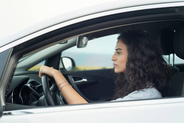 istock Woman driving a car 1152146245