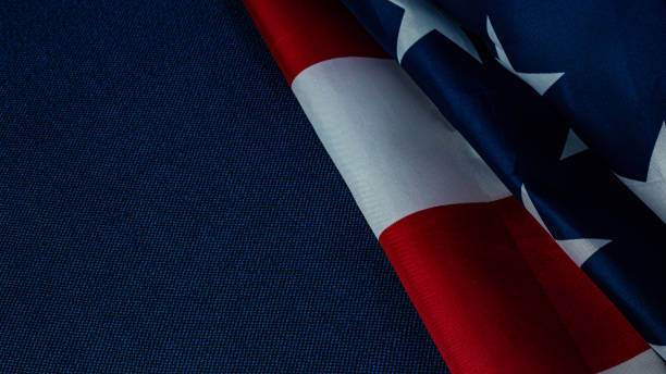 istock American flag on blue  independence day content. 1152147372