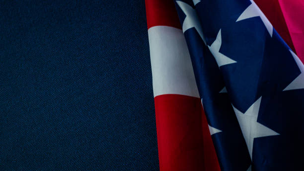 istock American flag on blue  independence day content. 1152147407