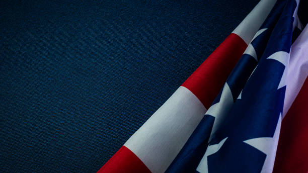 istock American flag on blue  independence day content. 1152147432