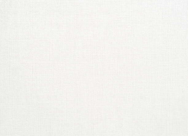 istock White sheet of paper with rough surface texture background. 1152154595