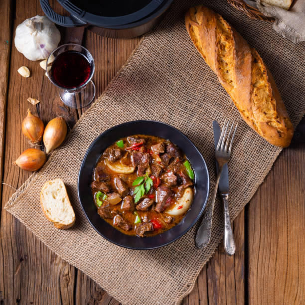 classic beef goulash with peppers and onions classic beef goulash with peppers and onions hungarian culture stock pictures, royalty-free photos & images