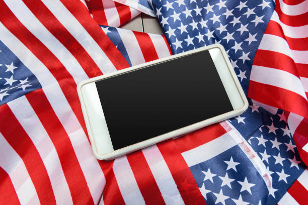 istock Us flag and smartphone 1152157136