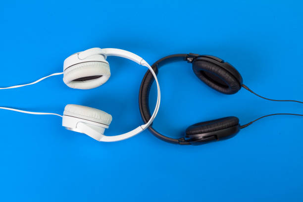 istock Headphones on blue background 1152159195