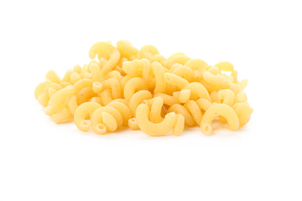 istock Pasta isolated on white background, closeup. Dry uncooked whole pasta 1152162176