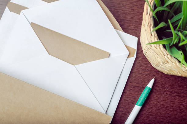 istock Photo of blank envelope on a  wooden background 1152164331