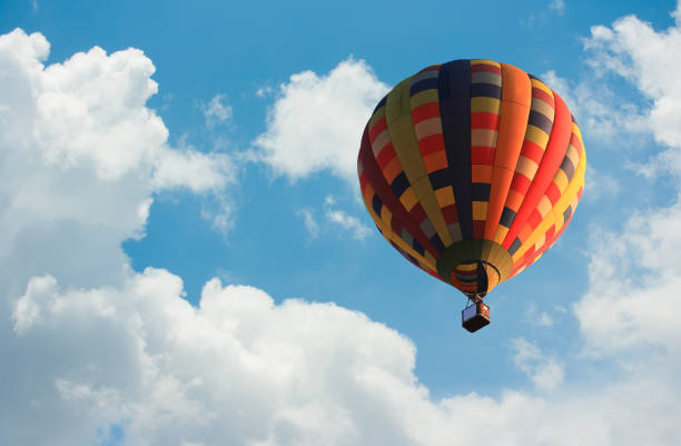 istock Low Angle View Of Hot Air Balloon Flying Against Sky 1152165965