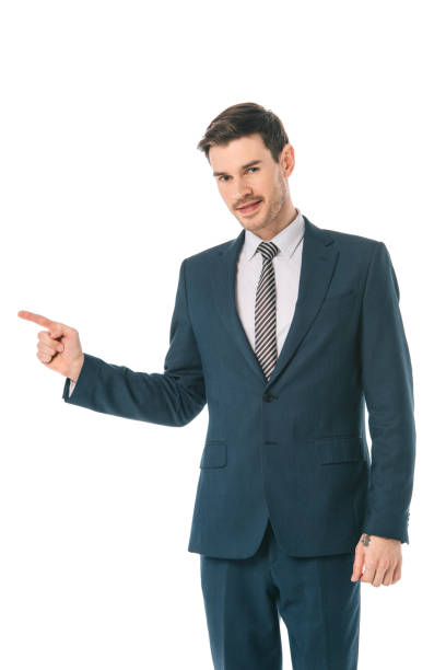 istock successful businessman pointing at something isolated on white 1152166230