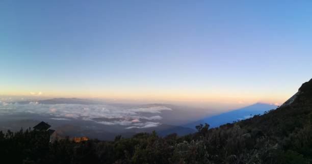 istock Shadow on the cloud, Hiking, Mount Kinabalu, Sabah, Malaysian Borneo 1152166757