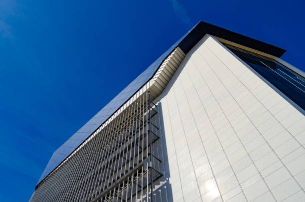 istock Bright Blue City Buildings With Clouds 1152170309