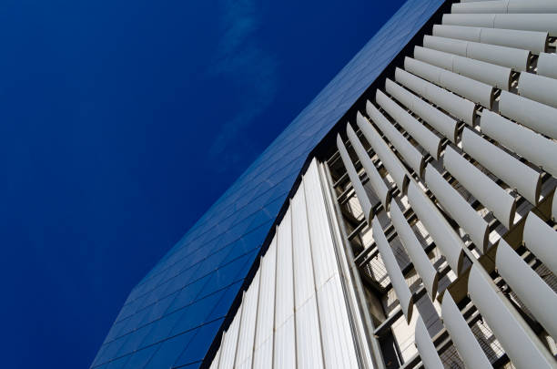 istock Bright Blue City Buildings With Clouds 1152171076