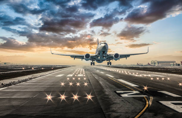 istock Passenger airplane taking off at sunset 1152171637