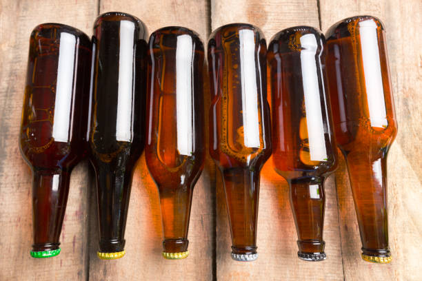 istock Beer bottles on a wooden table . 1152171682