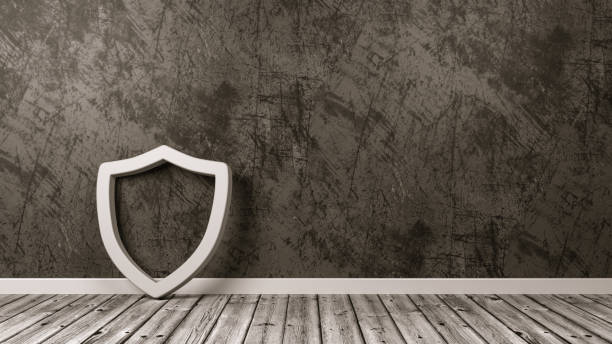 istock Shield Symbol on Wooden Floor Against Wall 1152171940