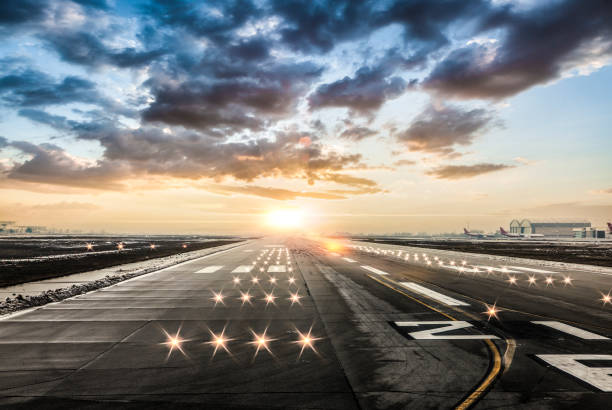 istock Airport runway in the evening sunset light 1152171965