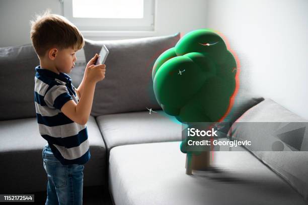 Augmented Reality Stock Photo - Download Image Now - Augmented Reality, Child, Digitally Generated Image