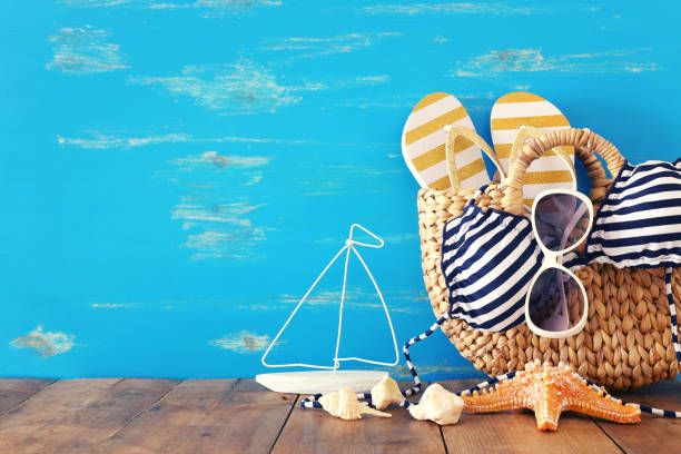 istock vacation and summer concept with sea life style objects over wooden table 1152173609