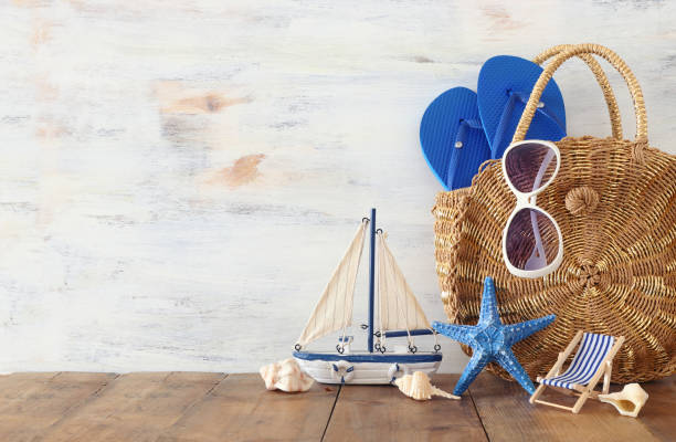 istock vacation and summer concept with sea life style objects over wooden table 1152173614