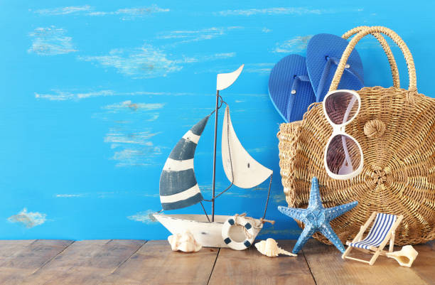 vacation and summer concept with sea life style objects over wooden table