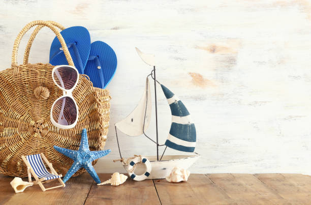 istock vacation and summer concept with sea life style objects over wooden table 1152173630